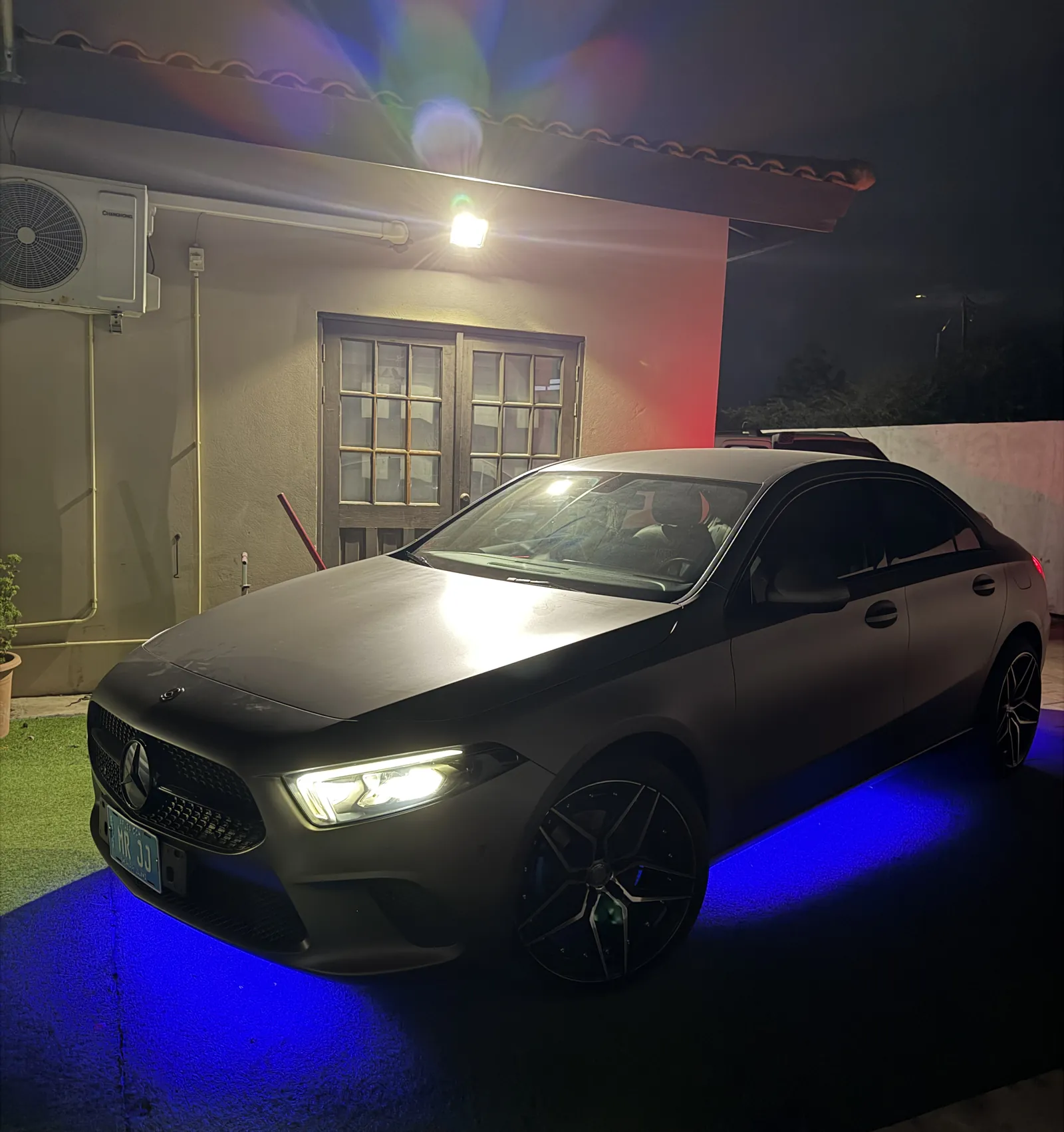 Mercedes CLA with blue underglow